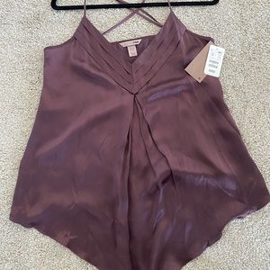 Blouse with detailing and criss-cross spaghetti straps.